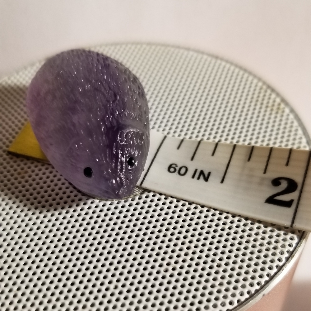 Cute hedgehog very light purple quartz crystal